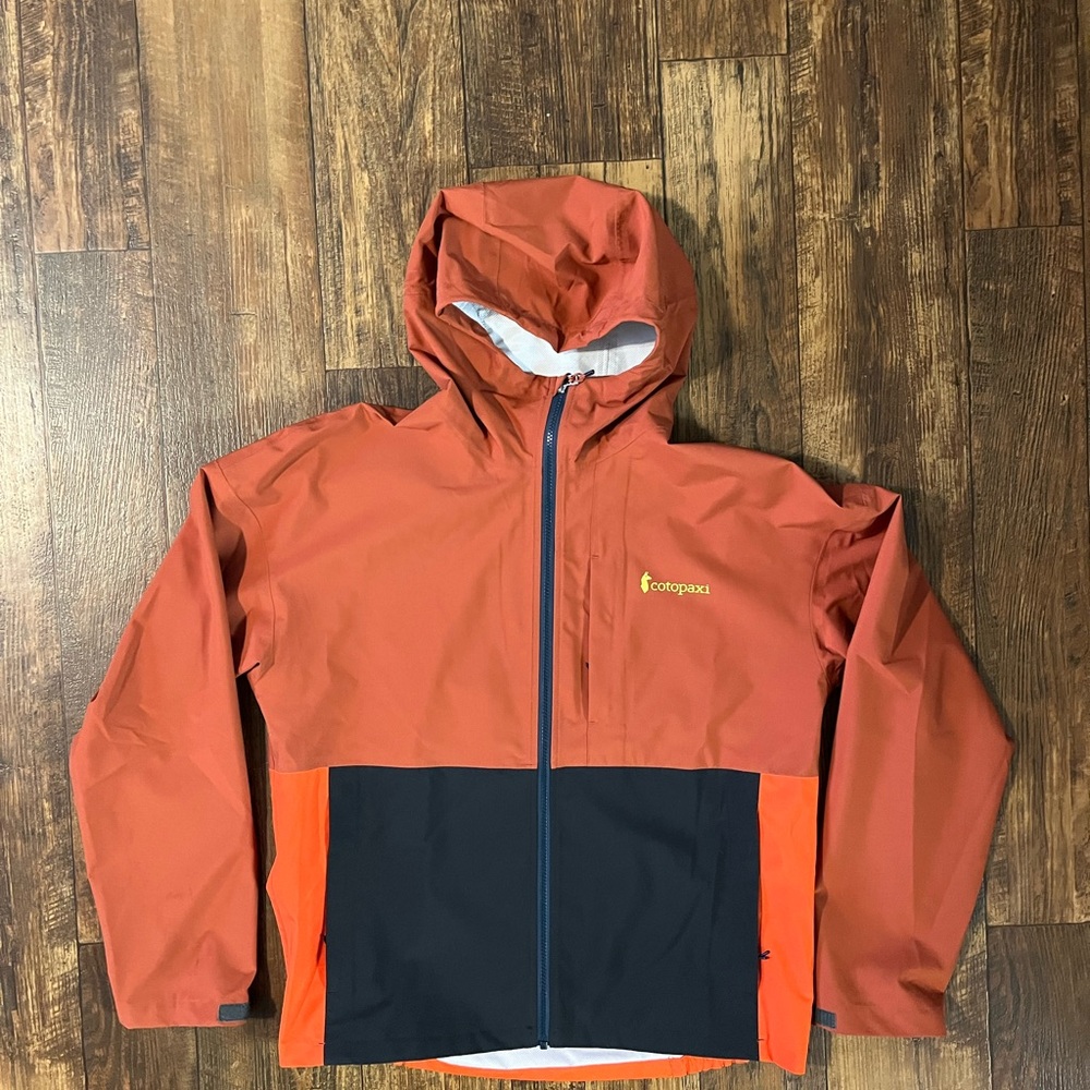 Orange and Black Outdoor Jacket by Cotopaxi